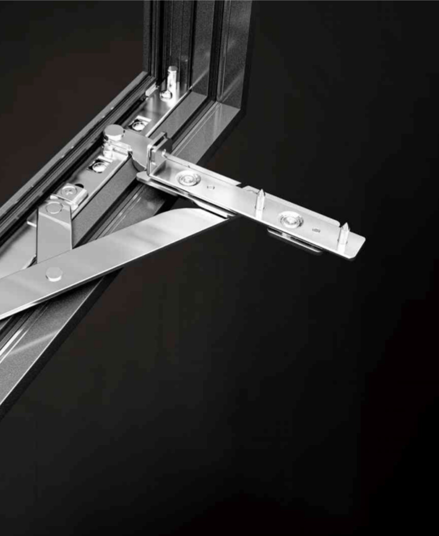 Steel outward-opening friction hinge mounted in a window frame
